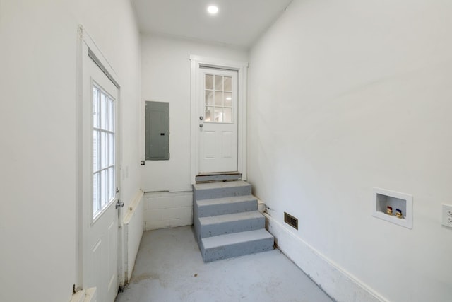 interior space featuring washer hookup and electric panel