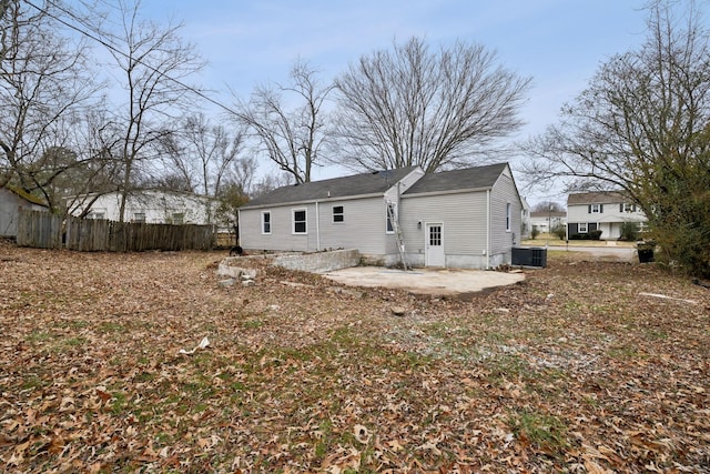 view of side of property featuring a patio and central air condition unit