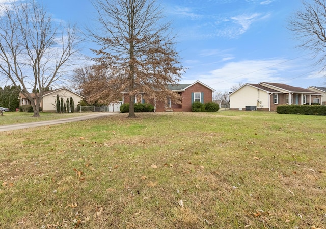 ranch-style home with a front yard