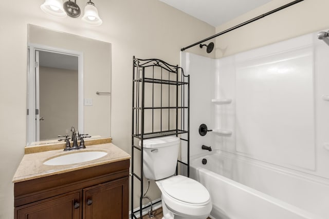 full bathroom featuring vanity,  shower combination, and toilet