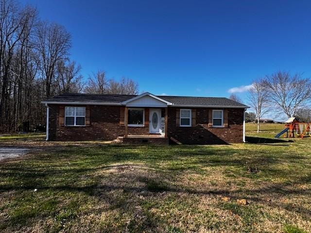 ranch-style home with a front lawn