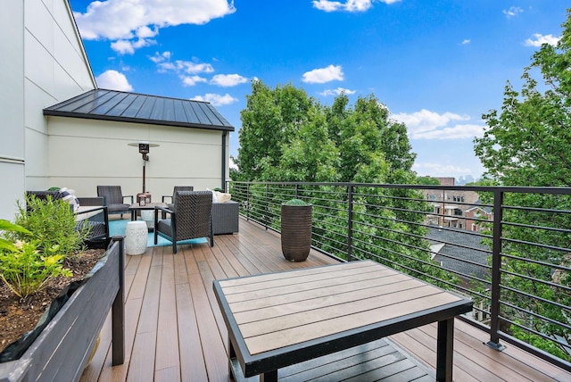 deck featuring outdoor lounge area