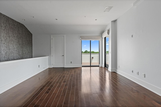 empty room featuring dark hardwood / wood-style floors