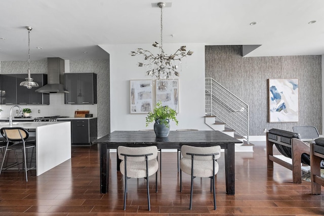 dining space featuring a notable chandelier