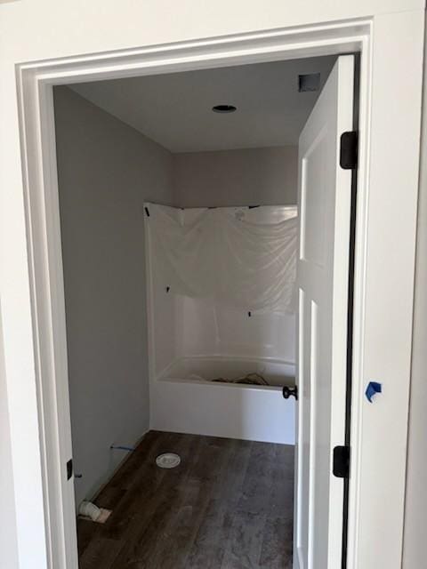 bathroom featuring wood-type flooring