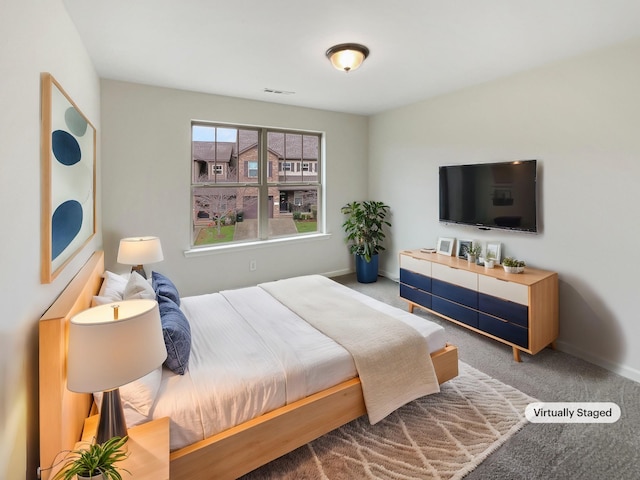 bedroom featuring carpet