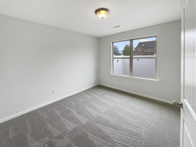 unfurnished room featuring carpet floors