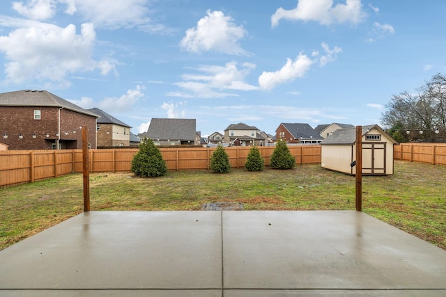 view of patio / terrace featuring a storage shed