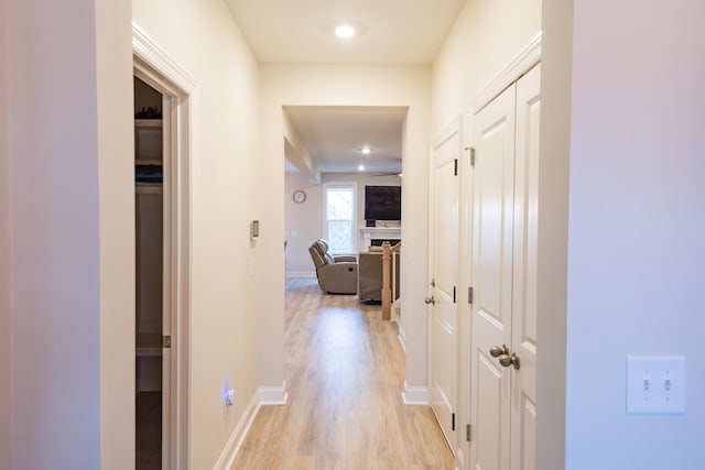 hallway featuring light hardwood / wood-style floors