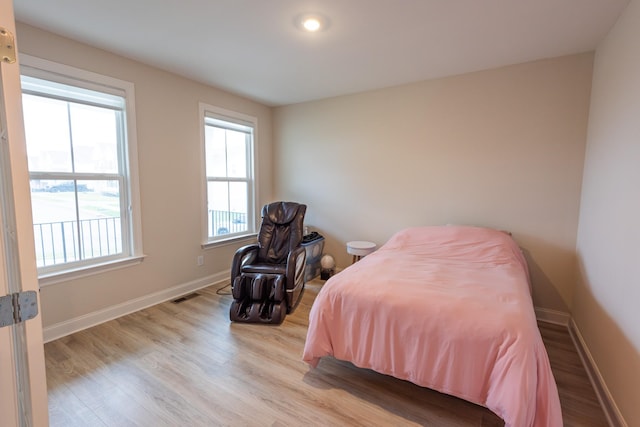 bedroom featuring light hardwood / wood-style floors