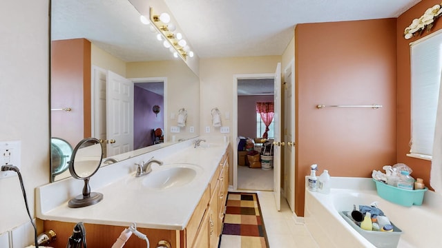 bathroom with vanity and a bathtub