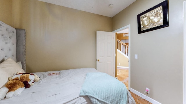 bedroom featuring light hardwood / wood-style floors