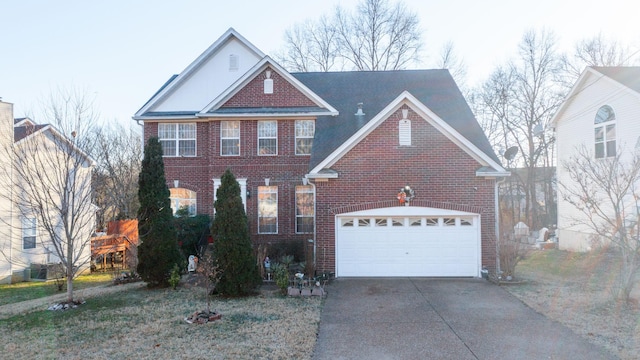 view of front of property featuring a garage