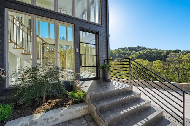 property entrance with a balcony