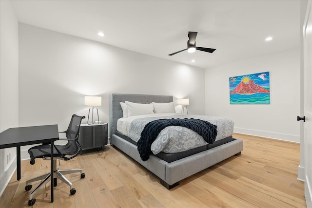 bedroom featuring ceiling fan and hardwood / wood-style floors