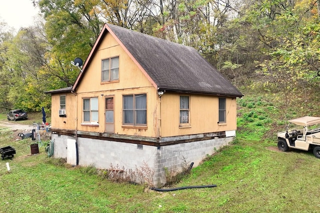 view of home's exterior featuring a yard