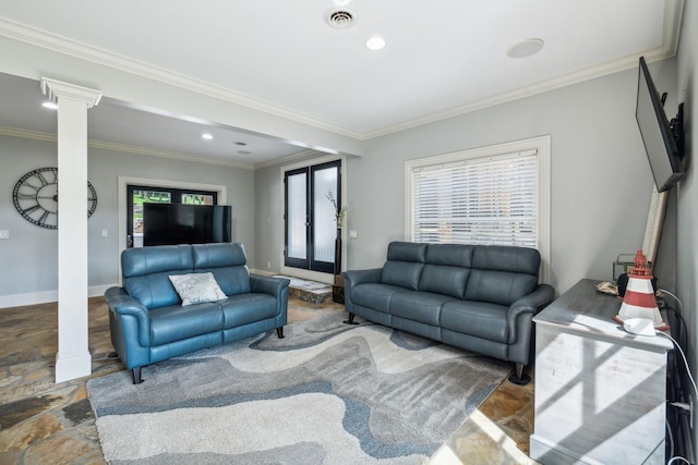 living room featuring french doors, ornate columns, plenty of natural light, and ornamental molding