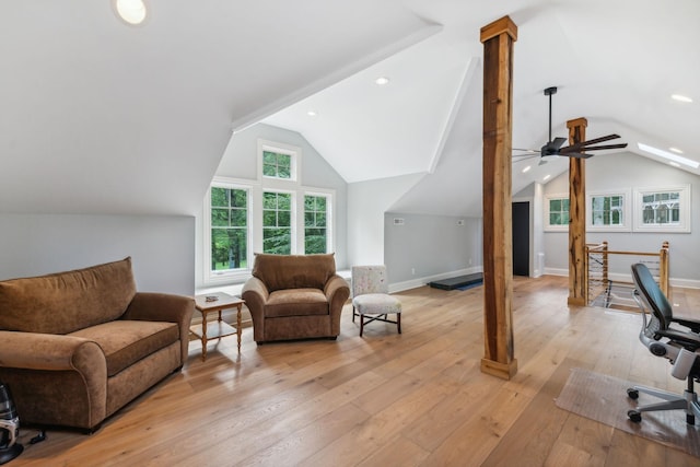 office with ceiling fan, light hardwood / wood-style floors, and vaulted ceiling