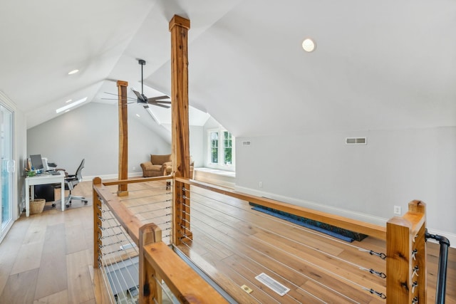 bonus room with ceiling fan, light hardwood / wood-style floors, and lofted ceiling