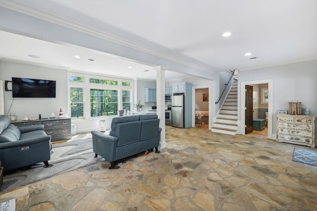 living room featuring crown molding