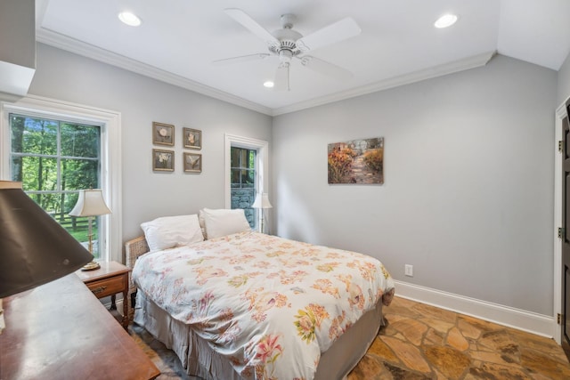 bedroom featuring ceiling fan, lofted ceiling, and crown molding