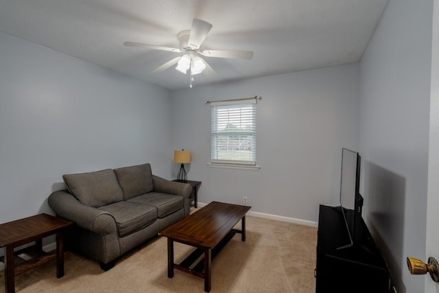 living room with light carpet and ceiling fan