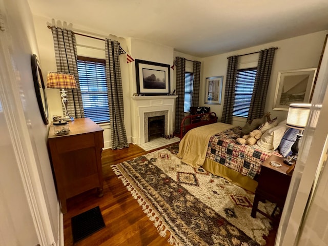 bedroom featuring dark wood-type flooring