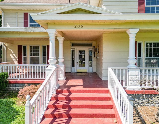 entrance to property featuring covered porch