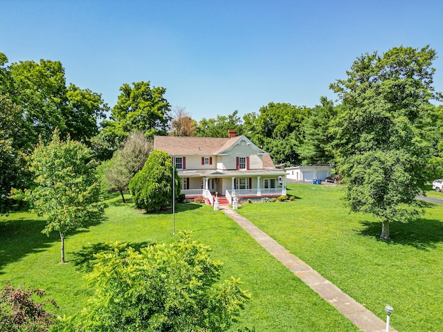 view of front of house featuring a porch and a front yard