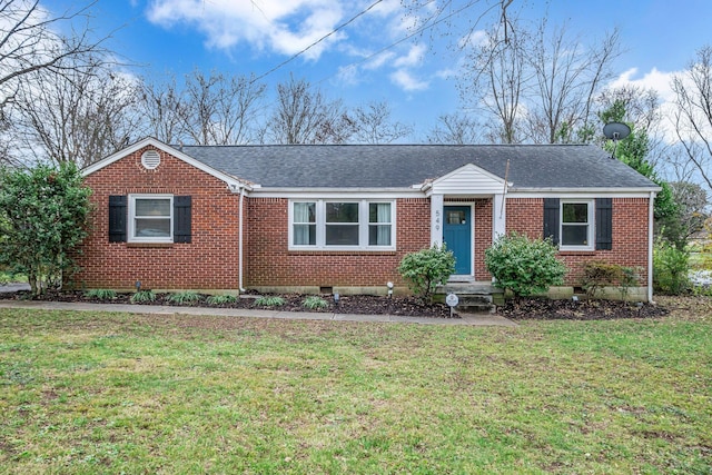 ranch-style house featuring a front lawn