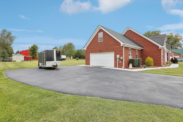 view of property exterior featuring a lawn and a garage