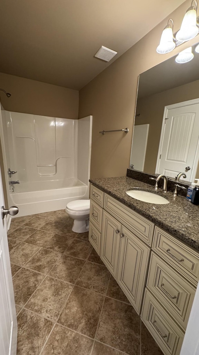 full bathroom with vanity, toilet, and tub / shower combination