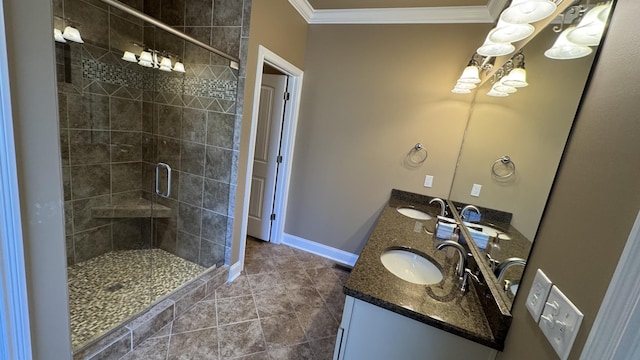 bathroom featuring vanity, tile patterned floors, a shower with door, and crown molding