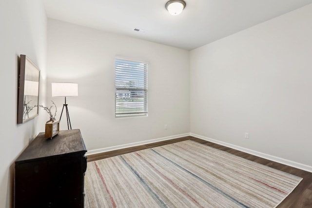 interior space with dark hardwood / wood-style flooring