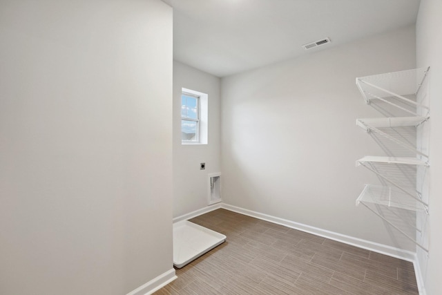 clothes washing area featuring hookup for an electric dryer