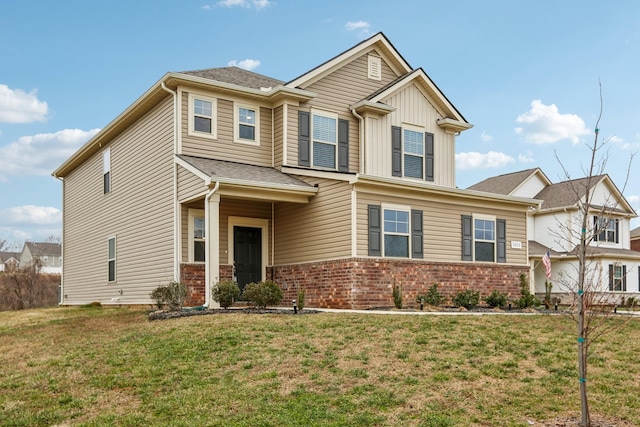 craftsman-style house with a front lawn