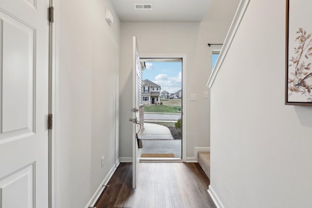 doorway featuring dark hardwood / wood-style flooring