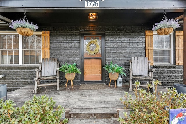 property entrance with a porch