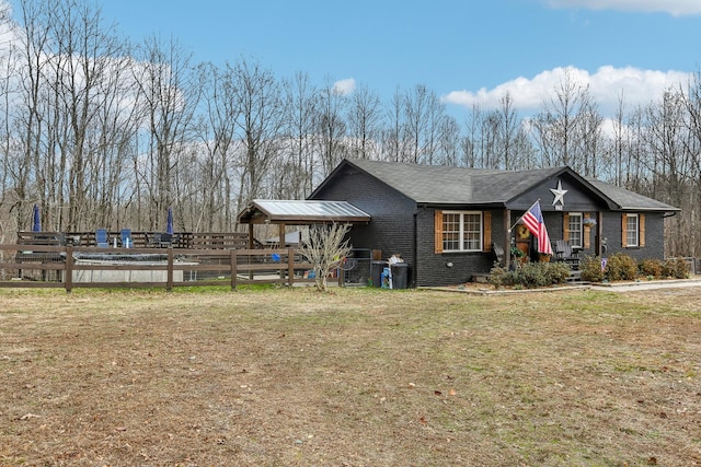 view of front of house with a front lawn