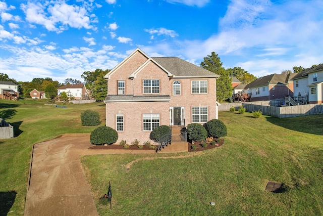 view of front of home featuring a front yard