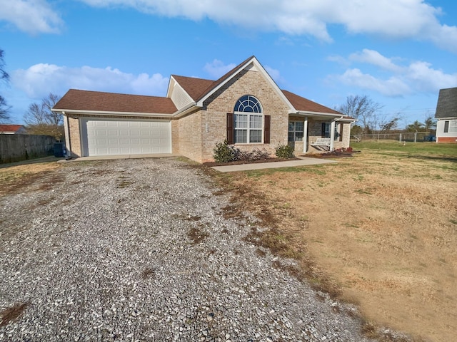 ranch-style home featuring a garage