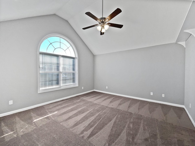 additional living space featuring carpet flooring, vaulted ceiling, and ceiling fan