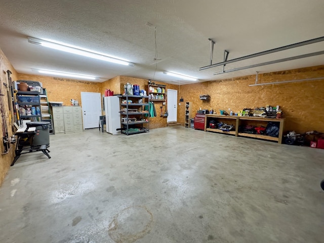 garage with a workshop area