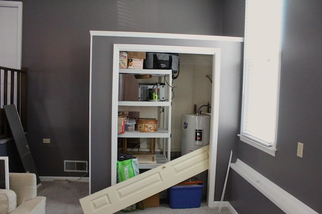 pantry featuring water heater