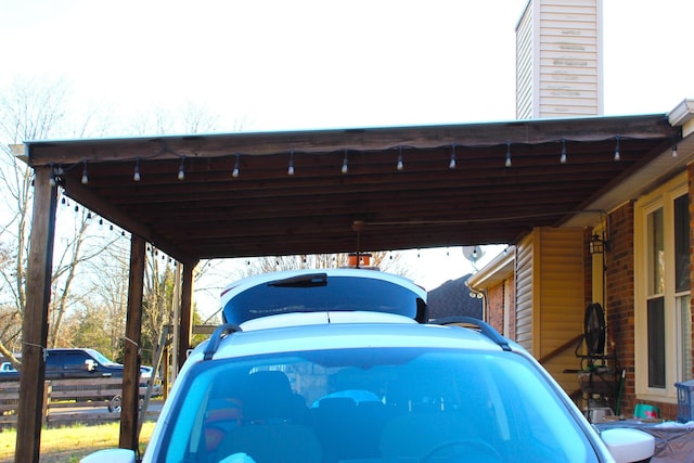 view of parking / parking lot with a carport