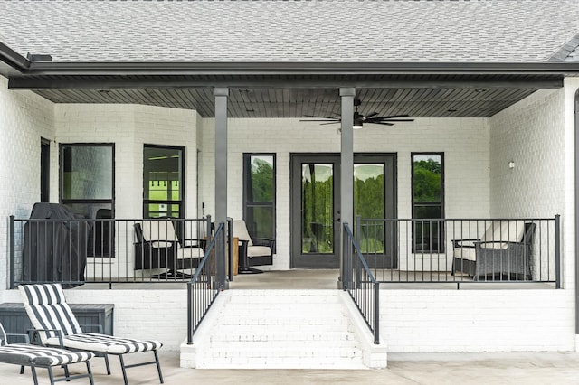 wooden deck featuring ceiling fan