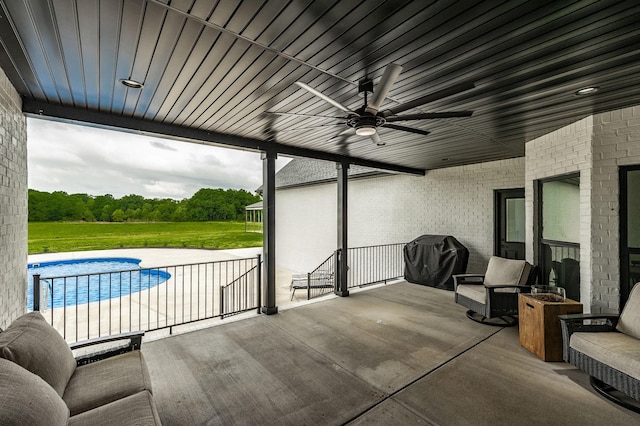 view of patio / terrace with grilling area and ceiling fan