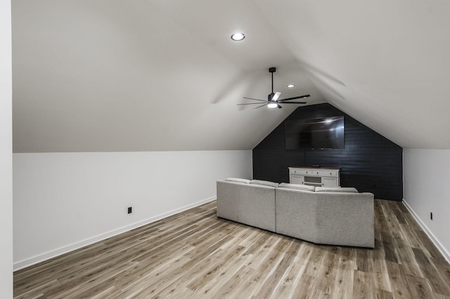 bonus room with lofted ceiling, wood-type flooring, and ceiling fan