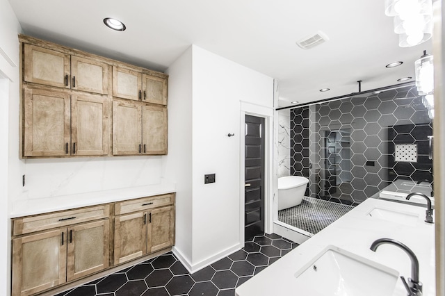 bathroom featuring separate shower and tub and vanity