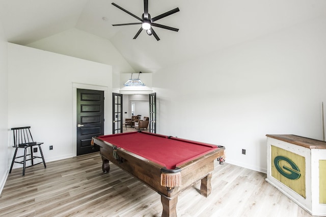 game room with vaulted ceiling, french doors, pool table, ceiling fan, and hardwood / wood-style flooring